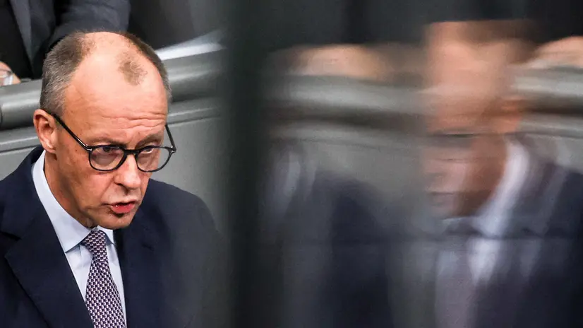 epa12457311 German Chancellor Friedrich Merz delivers a government statement during a session of the German parliament Bundestag in Berlin, Germany, 16 October 2025. EPA/FILIP SINGER