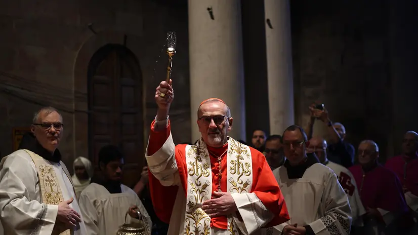 epa12036559 Apostolic Administrator of the Latin Church in the Holy land Pierbattista Pizzaballa celebrates the Washing of the Feet Catholic ceremony ahead of Easter, the Church of the Holy Sepulchre in the Old City of Jerusalem, 17 April 2025. EPA/ATEF SAFADI