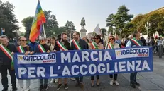 La marcia per l'accoglienza in centro a Brescia
