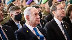 epa12458017 Israeli Prime Minister Benjamin Netanyahu participates in the ceremony of the Iron Swords War Memorial Day on Mount Herzl in Jerusalem, Israel, 16 October 2025 to commemorate the victims of the October 7 attacks. EPA/ALEX KOLOMOISKY / POOL