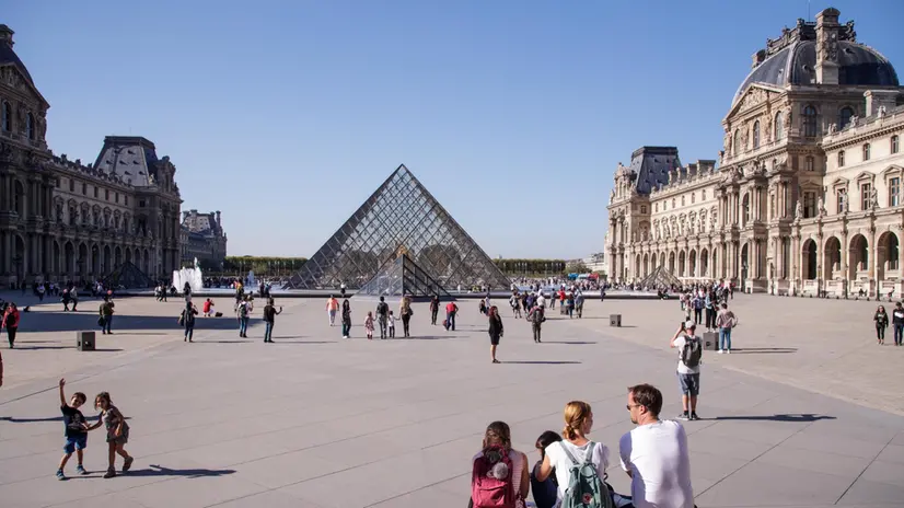 epa07083757 A view of the courtyard with the Cour Napoleon (R) museum entrance and the glass Pyramid of the Louvre Museum in Paris, France, 10 October 2018. EPA/CHRISTOPHE PETIT TESSON