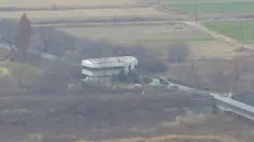 epa06343198 A handout screengrab of a surveillance video taken on 13 November 2017 and released by the United Nations Command (UNC) on 22 November 2017 shows a North Korean Korean People's Army (KPA) defector driving along a road leading to the truce village of Panmunjom. According to the UNC, a UNC Special Investigation Team conducted an investigation into the footage saying that the KPA violated the UN Armistice Agreement twice during the event by 'firing weapons across the Military Demarcation Line (MDL) and when the defecting soldier actually temporarily crossed the MDL' to reach the Joint Security Area (JSA) in the village of Panmunjom on 13 November 2017. EPA/UNITED NATIONS COMMAND HANDOUT -- BEST QUALITY AVAILABLE -- HANDOUT EDITORIAL USE ONLY/NO SALES