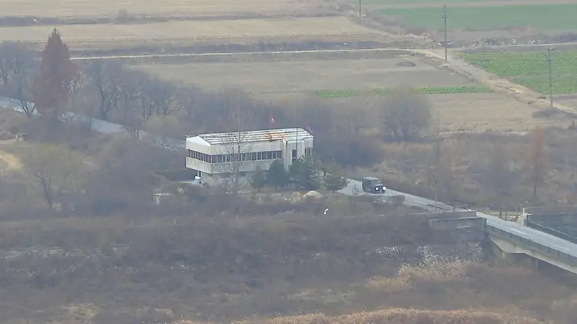 epa06343198 A handout screengrab of a surveillance video taken on 13 November 2017 and released by the United Nations Command (UNC) on 22 November 2017 shows a North Korean Korean People's Army (KPA) defector driving along a road leading to the truce village of Panmunjom. According to the UNC, a UNC Special Investigation Team conducted an investigation into the footage saying that the KPA violated the UN Armistice Agreement twice during the event by 'firing weapons across the Military Demarcation Line (MDL) and when the defecting soldier actually temporarily crossed the MDL' to reach the Joint Security Area (JSA) in the village of Panmunjom on 13 November 2017. EPA/UNITED NATIONS COMMAND HANDOUT -- BEST QUALITY AVAILABLE -- HANDOUT EDITORIAL USE ONLY/NO SALES