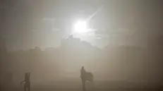 epaselect epa12420593 Internally displaced Palestinians take cover after an Israeli drone dropped a smoke bomb near Al Shifa hospital during an Israeli military operation in Gaza City, Gaza Strip, 01 October 2025. More than 66,000 Palestinians have been killed in the Gaza Strip since October 2023, according to the Palestinian Ministry of Health, and about 1,200 Israelis have been killed since the launch of an Israeli military campaign in response to a cross-border attack by Hamas on 07 October 2023. EPA/MOHAMMED SABER