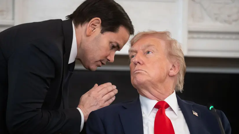 epa12440507 US Secretary of State Marco Rubio (L) speaks with President Donald Trump (R) during a Roundtable on Antifa in the State Dining Room of the White House in Washington, DC, USA, 08 October 2025. Trump on 22 September designated antifa as a 'domestic terrorist organization' via executive order. EPA/FRANCIS CHUNG / POOL