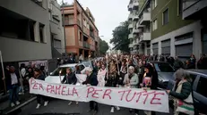 Fiaccolata per Pamela Genini nel quartiere Gorla a Milano, 19 ottobre 2025. ANSA/MOURAD BALTI TOUATI