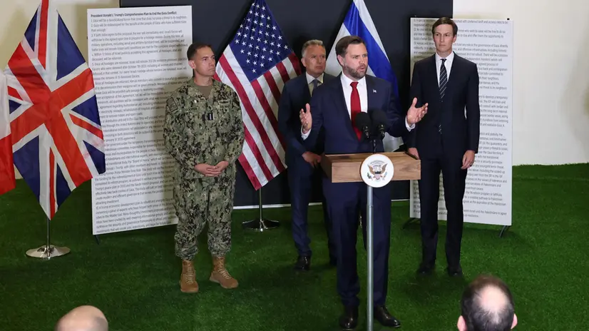 epa12470210 US Vice President JD Vance speaks during a media briefing at the US-led Civil-Military Coordination Center (CMCC) at an undisclosed location in southern Israel, 21 October 2025. EPA/ABIR SULTAN