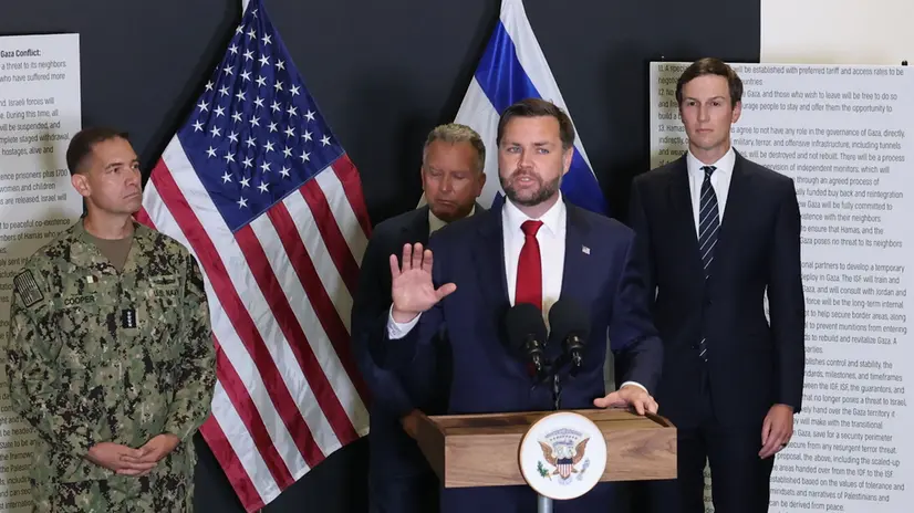 epa12470228 US Vice President JD Vance speaks during a media briefing at the US-led Civil-Military Coordination Center (CMCC) at an undisclosed location in southern Israel, 21 October 2025. EPA/ABIR SULTAN