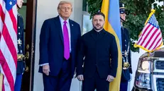 epa12460740 US President Donald Trump (L) greets Ukrainian President Volodymyr Zelensky as he arrives at the West Wing of the White House in Washington, DC, USA, 17 October 2025. The leaders are scheduled for a working lunch in the Cabinet Room, where President Zelensky is expected to request long-range missiles as part of an arms package. EPA/SHAWN THEW