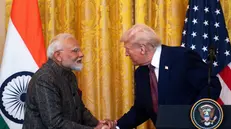 epa11894697 US President Donald Trump (R) shakes hands with Indian Prime Minister Narendra Modi (L) during a press conference at the White House, Washington, DC, USA, 13 February 2025. EPA/WILL OLIVER