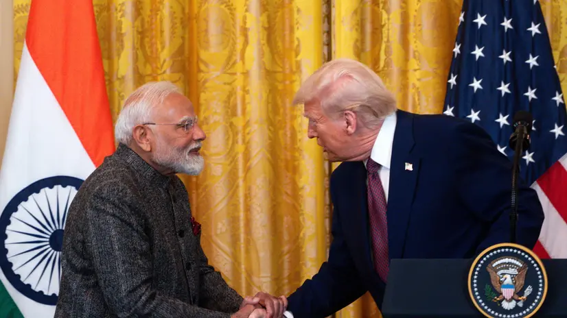 epa11894697 US President Donald Trump (R) shakes hands with Indian Prime Minister Narendra Modi (L) during a press conference at the White House, Washington, DC, USA, 13 February 2025. EPA/WILL OLIVER