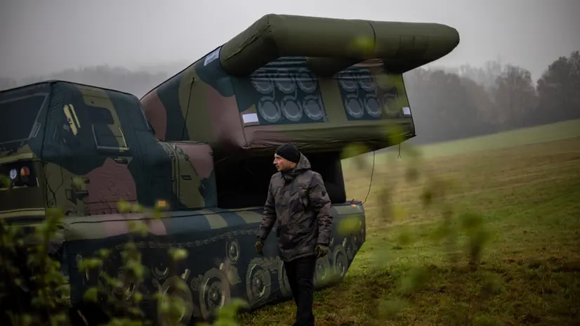 epa11720365 An inflatable decoy of a M270 MLRS military vehicle is displayed during a media presentation in Decin, Czech Republic, 11 November 2024 (issued 14 November 2024). Inflatech company from Decin produces hi-end military decoys designed for training and deception of reconnaissance and targeting systems of the opponent in combat ranging from fighters, all kinds of tracked or wheeled vehicles, tanks, and radars to helicopters, like Leopard 2A4, M1 Abrams, M142 HIMARS, M270 MLRS, Patriot, F-16, and SU-27. They sell to customers worldwide in real size. Inflatech is one of the few manufacturers in the world that produces inflatable deception targets capable of not only visually and dimensionally mimicking real machines. Inflatech's deceptive targets can also alone move independently using small power units, and have electronic systems that can simulate the operation of real vehicles and combat vehicles, such as thermal radiation traces, electronic signals, etc. The company is also working on other innovations such as remote control and self-propelled versions. Decoys are also extra lightweight, packable in bags, and easily transportable by a few soldiers because they are made of synthetic silk. For example, a replica Leopard 2A4 tank weighs only 44 kg. A properly trained and experienced operator can inflate it in a few minutes, as well as deflate it. Inflatech didn't say the price, but for comparison, the cost of the decoy is hundreds of times cheaper than a better Russian missile. Inflatech Chief Executive Vojtech Fresser would not confirm if their products are sold to Ukraine and being used by the Ukrainian military against the Russian invasion. However, as an example, he said that he learned from open sources that a Russian missile allegedly destroyed a Ukrainian-made Inflatech M270 MLRS decoy. EPA/MARTIN DIVISEK