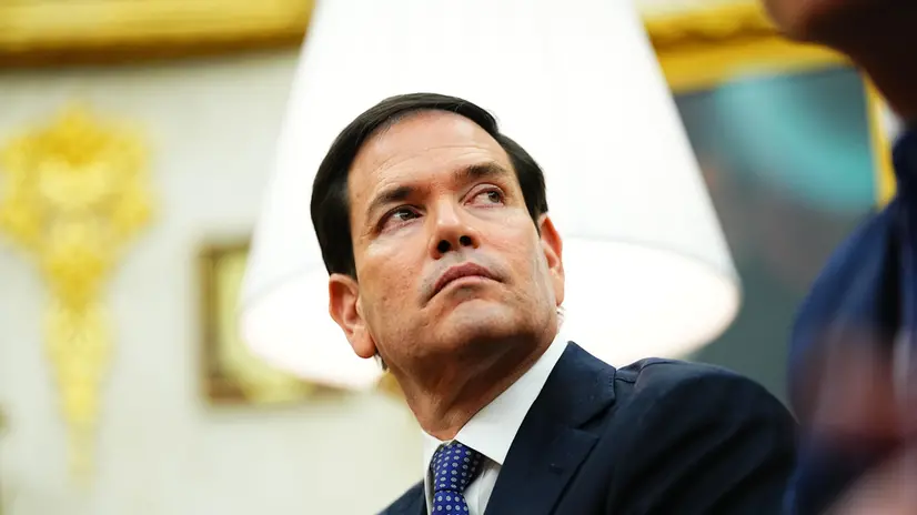 epa12474339 US Secretary of State Marco Rubio looks on as US President Donald J. Trump meets with NATO Secretary General Mark Rutte in the Oval Office of the White House in Washington, DC, USA, 22 October 2025. The leaders met to discuss continued support for Ukraine. EPA/AARON SCHWARTZ / POOL