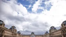 epa12466946 An exterior view of the Louvre Museum a day after a robbery in Paris, France, 20 October 2025. The Louvre Museum was targeted in a robbery by several criminals who smashed windows to steal eight priceless royal pieces of jewelry on 19 October. The Louvre remains closed for a second day running. French Culture Minister Rachida Dati called it 'an attack on France’s cultural heritage.' EPA/YOAN VALAT