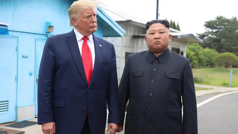epa07683981 US President Donald J. Trump (L) with North Korean leader Kim Jong-un before they hold talks at the Freedom House on the southern side of the truce village of Panmunjom in the Demilitarized Zone, which separates the two Koreas, 30 June 2019. The US leader arrived in South Korean on 29 June for a two-day visit that will include a meeting with South Korean President Moon Jae-in and a trip to the Demilitarized Zone. EPA/YONHAP SOUTH KOREA OUT