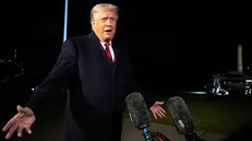 epa12480042 US President Donald Trump speaks with reporters as he departs on the South Lawn of the White House to board Marine One, in Washington, DC, USA, 24 October 2025. EPA/Francis Chung / POOL