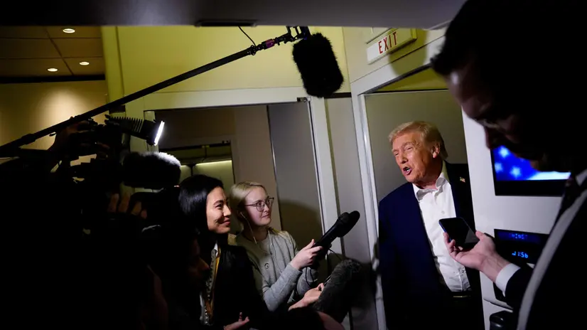 IN FLIGHT - OCTOBER 24: U.S. President Donald Trump speaks to members of the media aboard Air Force One on October 24, 2025, in flight. Trump is traveling to Malaysia for the Association of Southeast Asian Nations summit (ASEAN), Japan, and to South Korea for the Asia-Pacific Economic Cooperation forum (APEC). Andrew Harnik/Getty Images/AFP (Photo by Andrew Harnik / GETTY IMAGES NORTH AMERICA / Getty Images via AFP)