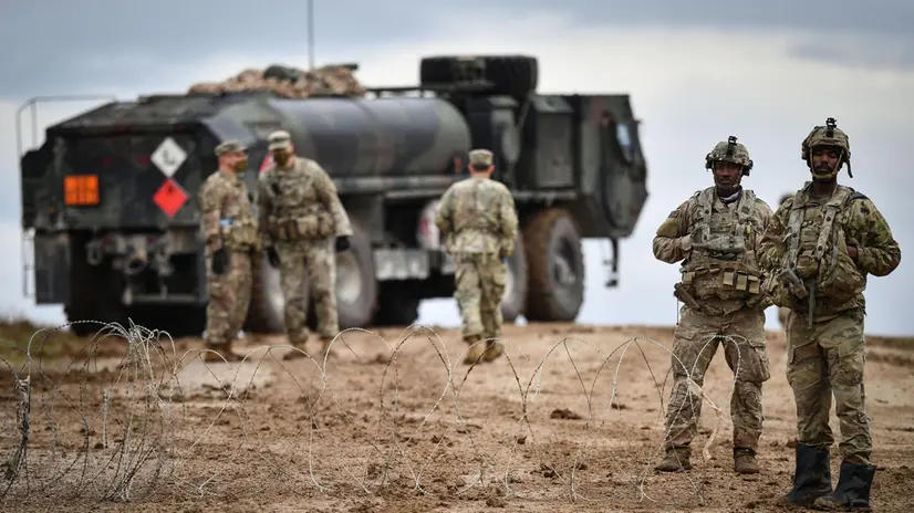 epa08697425 US soldiers participate in the military exercise ‚Combined Resolve XIV’at the US Army’s Joint Multinational Readiness Center in Hohenfels, Germany, 25 September 2020. In the military exercise, forces from the United States, France, Italy, Lithuania, North Macedonia, Poland, Romania, Slovenia and Ukraine train their joint operational capabilties. EPA/PHILIPP GUELLAND