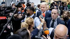 epa12489594 Party for Freedom (PVV) leader Geert Wilders (C) speaks to the press after casting his vote for the House of Representatives elections at City Hall in The Hague, The Netherlands, 29 October 2025. EPA/KOEN VAN WEEL