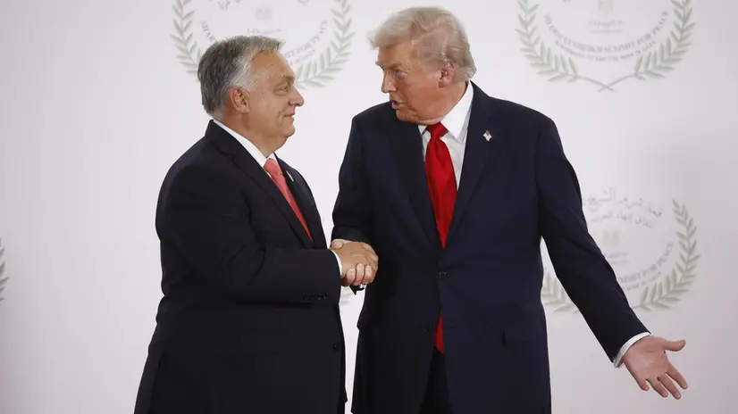 epa12451534 Hungarian Prime Minister Viktor Orban (L) and US President Donald Trump (R) pose during the greetings ceremony before the family picture at the Gaza Peace Summit in Sharm El-Sheikh, Egypt, 13 October 2025. US President Donald Trump alongside Egypt's President Abdel Fattah al-Sisi with leaders from more than 20 countries attend the summit in Sharm El-Sheikh. The first phase of Gaza peace plan between Israel and Hamas involves the release of Israeli hostages and Palestinian prisoners, the partial withdrawal of Israeli forces, and the delivery of humanitarian aid to Gaza. EPA/YOAN VALAT / POOL