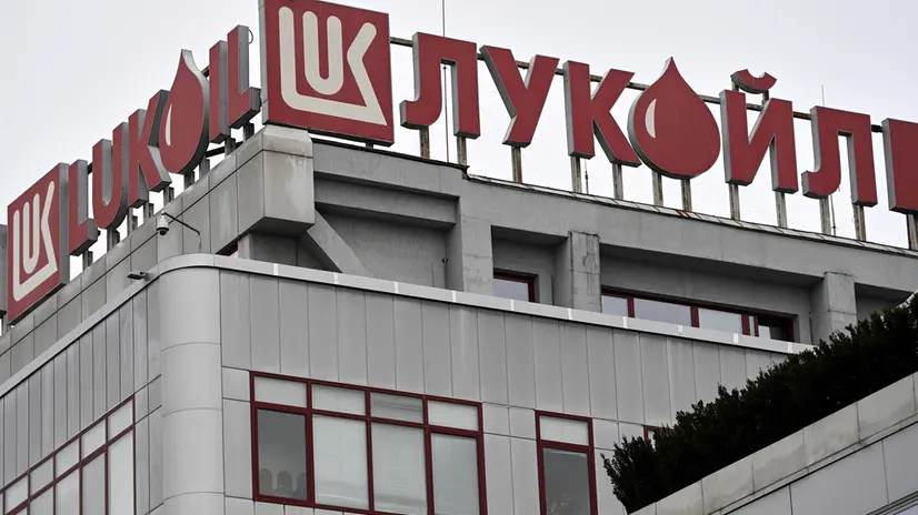 epa11015163 The logo of the Russian oil company Lukoil is seen on its central office building in Sofia, Bulgaria, 07 December 2023. Lukoil announced that it is considering the sale of its largest oil refinery in the Balkans, Neftohim, in Burgas, following measures by Bulgarian authorities seeking to reduce the nation's energy dependence on Russia. EPA/VASSIL DONEV