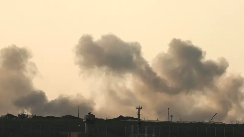 epa11076419 Smoke rises as a result of Israeli shelling over the Abasan area, east of Khan Younis, in the southern Gaza Strip, as seen from an undisclosed location in southern Israel, 14 January 2024. Israel marks on 14 January 2024 the one-hundredth day since the 07 October Hamas attacks. More than 23,600 Palestinians and at least 1,300 Israelis have been killed, according to the Palestinian Health Ministry and the Israel Defense Forces (IDF), since Hamas militants launched an attack against Israel from the Gaza Strip on 07 October, and the Israeli operations in Gaza and the West Bank which followed it. EPA/ATEF SAFADI