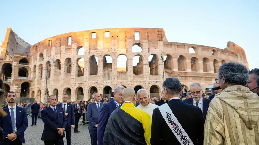 Pope Leo XIV attends an inter-religious meeting to pray for peace outside the Colosseum in Rome, Tuesday, Oct. 28, 2025. (AP Photo/Gregorio Borgia)