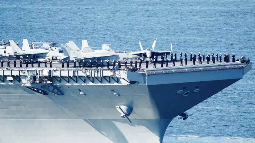 epa10649368 Soldiers stand guard on the American aircraft carrier USS Gerald R. Ford on its way into the Oslo Fjord in Drobak, Norway, 24 May 2023. The world's largest warship will be in the port of Oslo for four days. EPA/Terje Pedersen NORWAY OUT