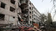 epa12492671 Ukrainian rescuers work at the site of a Russian strike on a residential area in Zaporizhzhia, southeastern Ukraine, 30 October 2025, amid the Russian invasion. At least one person was killed and 15 others were injured, including 4 children, after a Russian strike on Zaporizhzhia, according to the State Emergency Service report. EPA/OLEG MOVCHANIUK