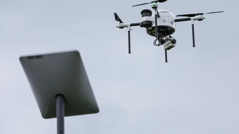 epa10610538 A drone moves through the air during Port of Antwerp-Bruges' drone network presentation in the port in Antwerp, Belgium, 05 May 2023. Six autonomous drones will perform multiple daily flights in the Antwerp port area soon. Port of Antwerp-Bruges and partners DroneMatrix, Skeydrone and Proximus have set up a 'D-Hive' drone network for this purpose for inspections of infrastructure, incidents, oil slick, drug related crime and floating debris. EPA/OLIVIER MATTHYS