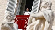 Pope Leo XIV leads the Angelus prayer from the window of his office overlooking Saint Peter's Square, in Vatican City, 2 November 2025. ANSA/FABIO FRUSTACI