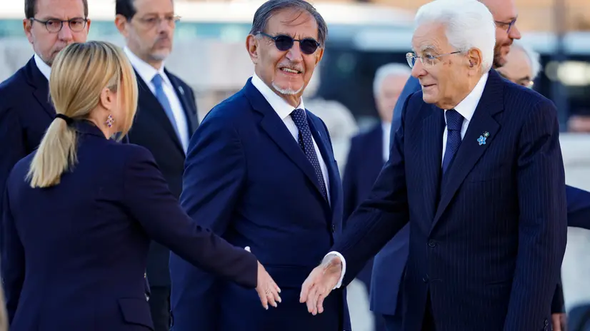(L-R) Italian Prime Minister Giorgia Meloni, Italy’s Senate President Ignazio La Russa and Italian President Sergio Mattarella during a ceremony of laying a wreath on the Tomb of the Unknown Soldier on the occasion of National Unity Day and Armed Forces Day, Altar of the Fatherland, Rome 4 November 2025. ANSA/FABIO FRUSTACI