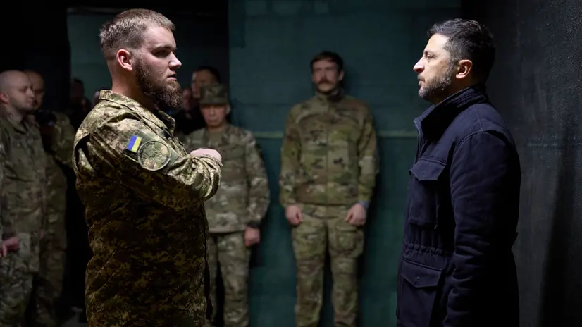 epa12502403 A handout photo made available by the Ukrainian Presidential Press Service shows Ukraine's President Volodymyr Zelensky hands awards to servicemen during his working visit to the frontline in the Donetsk region, eastern Ukraine, 04 November 2025, amid the Russian invasion. The Ukrainian president met with the military at the command post of the 1st Corps of the National Guard of Ukraine 'Azov,' which, together with adjacent units, is conducting a defensive operation in the Dobropillia sector in the Pokrovsk district of the Donetsk region. EPA/UKRAINIAN PRESIDENTIAL PRESS SERVICE HANDOUT -- MANDATORY CREDIT: UKRAINIAN PRESIDENTIAL PRESS SERVICE -- HANDOUT EDITORIAL USE ONLY/NO SALES