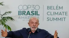 epa12502948 Brazilian President Luiz Inacio Lula da Silva speaks during an interview with journalists from international news agencies ahead of the COP30 Climate Summit, at the Belem Naval Base, Brazil, 04 November 2025. Lula da Silva expressed his confidence that US President Trump will eventually realize that 'there is no alternative' to the energy transition. The COP30 takes place from 10 to 21 November 2025. EPA/Sebastiao Moreira