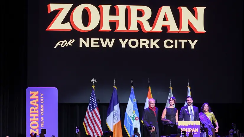 epa12504031 Mayor elect of New York City Zohran Mamdani (2-R), his father Mahmood Mamdani (L), spouse Rama Duwaji )2-L), and mother Mira Nair take the stage during an election night party hosted by the Democratic nominee in the Brooklyn borough of New York, USA, 04 November 2025. Mamdani has defeated Andrew Cuomo to win the New York mayoral election. EPA/SARAH YENESEL