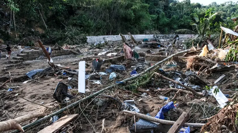 epa12504375 Debris from houses destroyed due to floods caused by typhoon Kalmaegi are seen at a riverside community in Bacayan, Cebu City, Philippines, 05 November 2025. Typhoon Kalmaegi crossed the Visayas region of the central Philippines on November 4 and caused flooding, power outages, and property damage. According to the National Disaster Risk Reduction and Management Council (NDRRMC), 66 people have died from effects of the typhoon. Data from the Philippine Atmospheric, Geophysical, and Astronomical Services Administration (PAGASA) projects the typhoon to be 190 kilometers west of Palawan province, moving west at 20 kilometers per hour with maximum winds of 130 kilometers per hour. EPA/JUANITO ESPINOSA