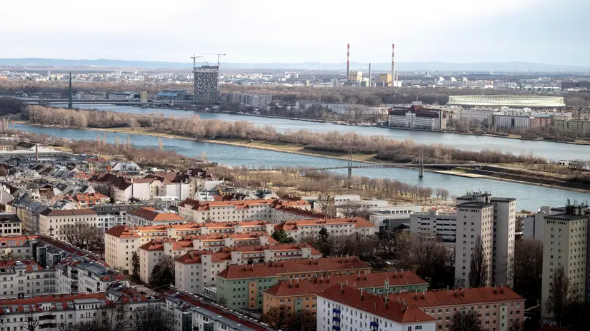 epa09070082 A general view of Vienna’s Kaisermuehlen neighbourhood and the Danube river (Donau) is seen from the IAEA headquarters of the UN seat in Vienna, Austria, 12 March 2021. EPA/CHRISTIAN BRUNA