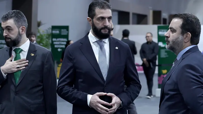 epa12509560 Syrian President Ahmed Al Sharaa (C) attends the opening of the COP30 leaders' summit at the Hangar Convention Center in Belem, Brazil, 06 November 2025. The COP30 Leaders' Summit precedes the main 30th United Nations Climate Change Conference in Belem, Brazil. The conference, running from 10 to 21 November is strategically located at the gateway to the Amazon rainforest. EPA/ANDRE COELHO