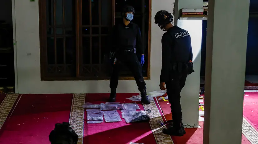 epa12510388 Members of police the bomb squad inspect the site of an explosion inside a school mosque in Jakarta, Indonesia, 07 November 2025. At least 54 people were injured after an explosion at a mosque inside a school compound during Friday prayers, according to the police. The cause of the incident is still under investigation. EPA/MAST IRHAM