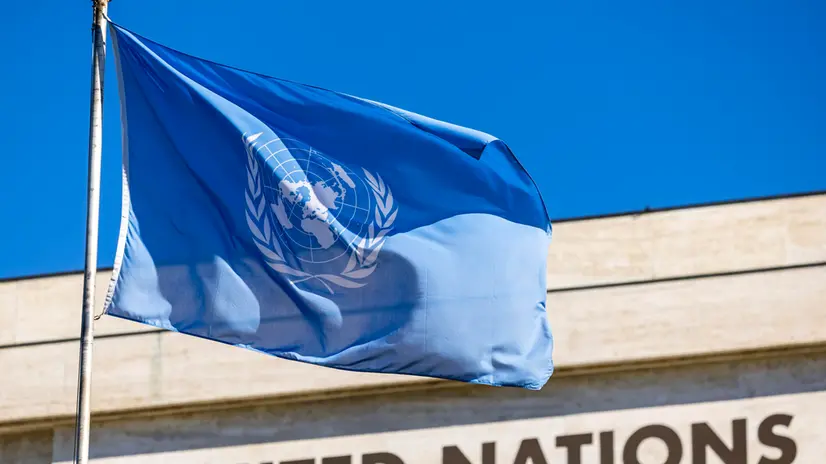 epa12435169 The United Nations (UN) flag is seen flying in front of Building A at the European headquarters of the United Nations in Geneva, Switzerland, 06 October 2025. EPA/SALVATORE DI NOLFI
