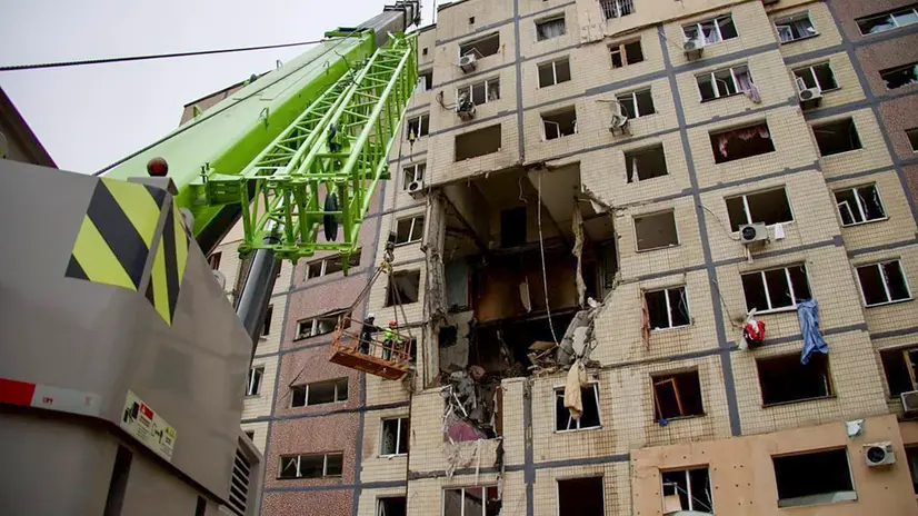 epa12511632 A handout photo made available by the Dnipropetrovsk Regional State Administration shows Ukrainian rescuers working at the site of a Russian strike on a residential building in Dnipro, central Ukraine, 08 November 2025, amid the Russian invasion. The administration said at least one woman died and 11 others were injured, including two children, after overnight Russian shelling hit Dnipro. EPA/DNIPROPETROVSK REGIONAL STATE ADMINISTRATION HANDOUT HANDOUT EDITORIAL USE ONLY/NO SALES