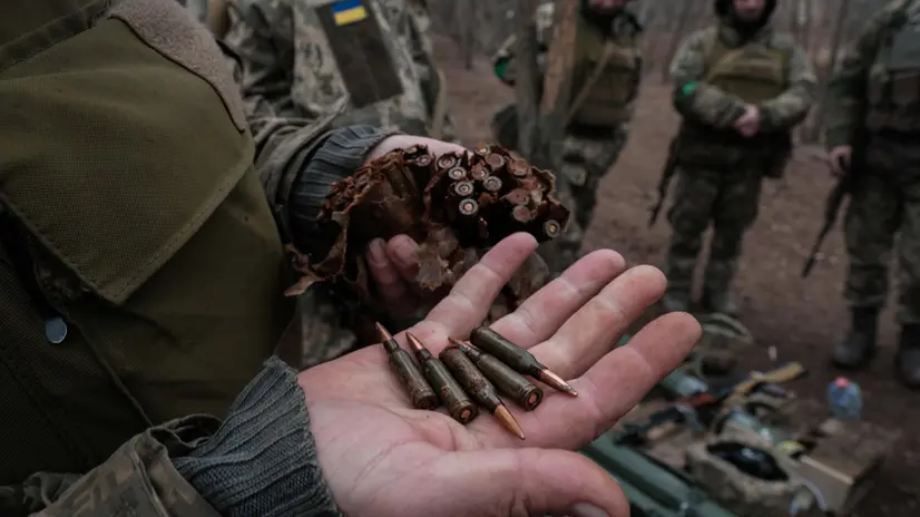 epa11222862 An Ukrainian soldier shows ammunition as new recruits receive training at an undisclosed location in the Donetsk region to complete their formation as infantrymen of Ukraine's 22nd Army Brigade, Donetsk, Ukraine 15 March 2024. The training lasts several months and recruits are instructed in combat medicine, handling of small arms, RPGs and BMP-1 type armoured vehicles, among other training. The Ukrainian Army is currently seeking to enlist 350,000 new soldiers to replace those who have been fighting for more than two years after Russian troops entered Ukrainian territory in February 2022, starting a conflict that has provoked destruction and a humanitarian crisis. EPA/Maria Senovilla