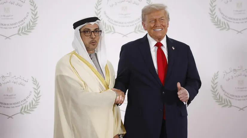epa12451576 United Arab Emirates Vice President Sheikh Mansour bin Zayed al-Nahyan (L) and US President Donald Trump pose during the greetings ceremony before the family picture at the Gaza Peace Summit in Sharm El-Sheikh, Egypt, 13 October 2025. US President Donald Trump alongside Egypt's President Abdel Fattah al-Sisi with leaders from more than 20 countries attend the summit in Sharm El-Sheikh. The first phase of Gaza peace plan between Israel and Hamas involves the release of Israeli hostages and Palestinian prisoners, the partial withdrawal of Israeli forces, and the delivery of humanitarian aid to Gaza. EPA/YOAN VALAT / POOL