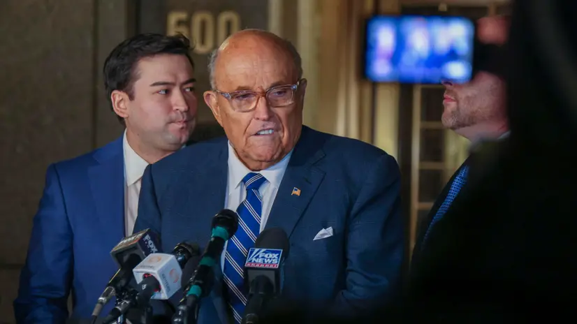 epaselect epa11804462 Former Trump Lawyer Rudy Giuliani (C) talks to the media after a hearing on whether he should be found in contempt of court for ignoring court orders at a federal courthouse in New York, New York, USA, 03 January 2025. Giuliani took the stand and the hearing will continue at another time. EPA/SARAH YENESEL