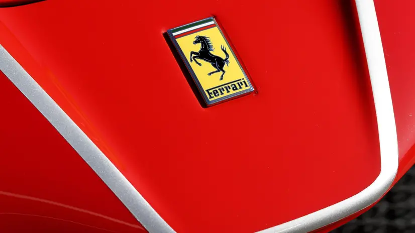 epa06255679 The Ferrari symbol, the Cavallino Rampante (prancing horse) with Ferrari lettering, is seen on a LaFerrari Aperta hybrid sports car in Albert Park, the home of the Australian Grand Prix, in Melbourne, Victoria, Australia, 10 October 2017. More than 100 Ferrari cars have descended on the park as the Italian luxury sports car mark its 70th anniversary in Australia. EPA/JOE CASTRO AUSTRALIA AND NEW ZEALAND OUT
