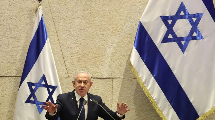 epa12516448 Israel's Prime Minister Benjamin Netanyahu speaks during a plenary session at the Knesset, the Israeli parliament in Jerusalem, 10 November 2025. The session has been initiated by the opposition demanding the establishment of a state inquiry conference to investigate the 07 October 2023 massacre. EPA/ABIR SULTAN
