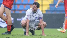 Il sorriso amaro sul volto di capitan Balestrero - Foto New Reporter Nicoli © www.giornaledibrescia.it