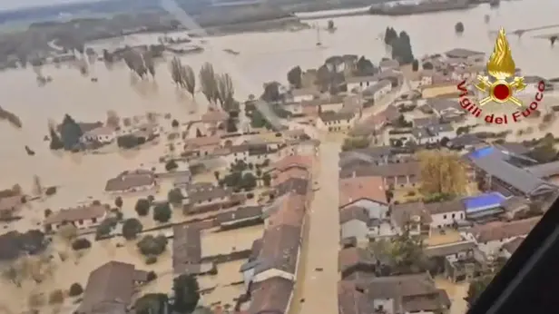 epa12531119 A handout photo made available by the Vigili del Fuoco, the Italian corps of Firefighters, shows aerial view of major flooding near Udine in the area of Friuli Venezia Giulia, in Northern Italy, 17 November 2025, after heavy rainfall. Firefighters have carried out dozens of operations so far to help drivers in distress, people trapped in their homes by water, floods, and landslides. EPA/VIGILI DEL FUOCO HANDOUT BEST QUALITY AVAILABLEHANDOUT EDITORIAL USE ONLY/NO SALES