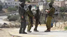 Forze israeliane armate - Foto Ansa © www.giornaledibrescia.it