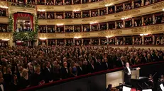 epa12577466 A handout photo made available by the Teatro alla Scala press office shows the audience's applauding for Senator for Life Liliana Segre as she entered the theater's main box, which opens this year's opera season with 'A Lady Macbeth in the Mtsensk District,' conducted by Riccardo Chailly, on his twelfth and final as the theater's music director in Milan, Italy, 07 December 2025. EPA/TEATRO ALLA SCALA HANDOUT +++ ANSA PROVIDES ACCESS TO THIS HANDOUT PHOTO TO BE USED SOLELY TO ILLUSTRATE NEWS REPORTING OR COMMENTARY ON THE FACTS OR EVENTS DEPICTED IN THIS IMAGE - NO ARCHIVING - NO LICENSING - NPK +++HANDOUT EDITORIAL USE ONLY/NO SALES
